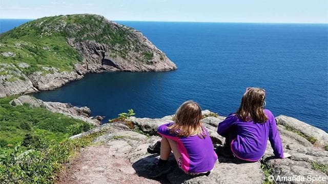 Backpacking with kids: children enjoying coastal view